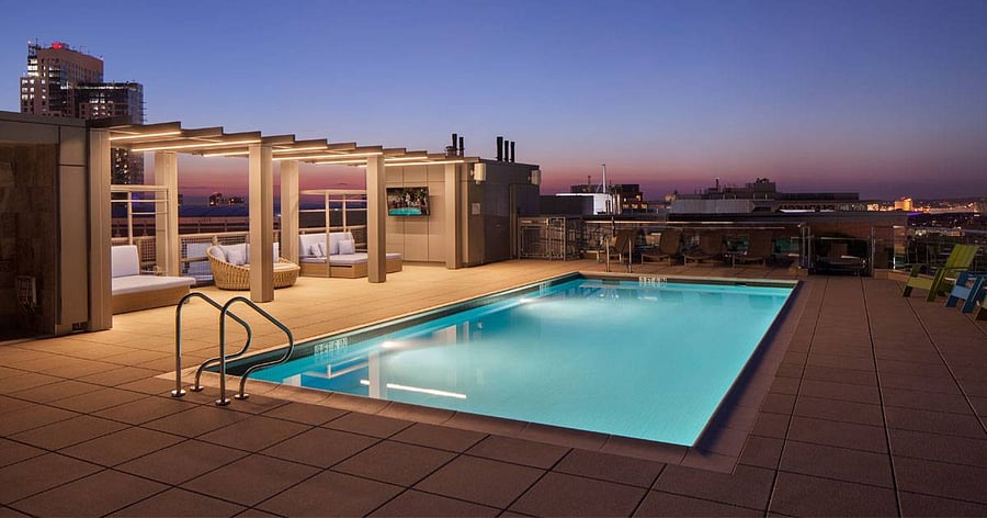 ROOFTOP LOUNGE & SWIMMING POOL
-- (EXTERIOR AMENITY / COMMON SPACE)
-- open to all residents in the building.