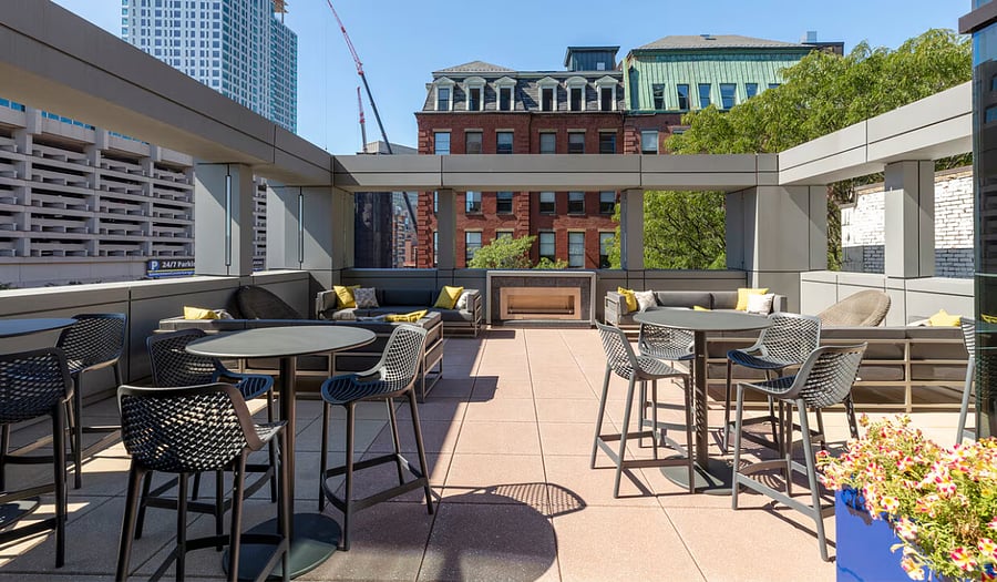 OUTDOOR LOUNGE & FIRE PLACE
-- (EXTERIOR AMENITY / COMMON SPACE)
-- open to all residents in the building.