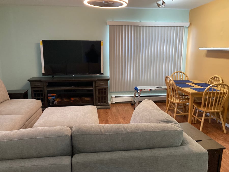 Livingroom W/dining table, electric fireplace, 65" smart TV