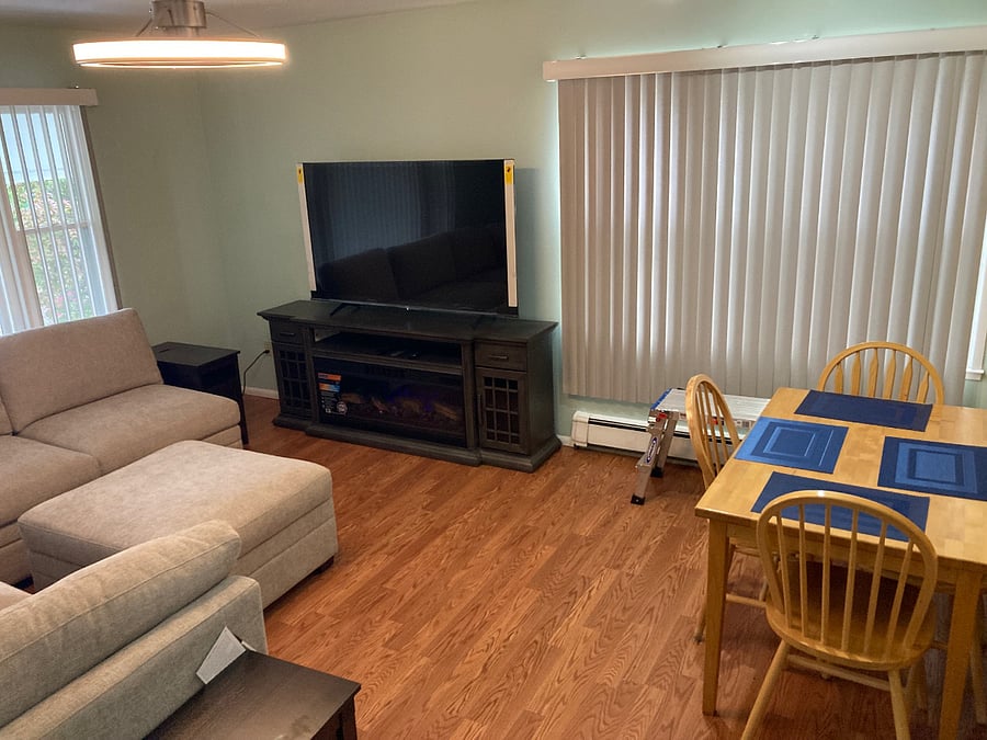Livingroom W/dining table, electric fireplace, 65" smart TV
