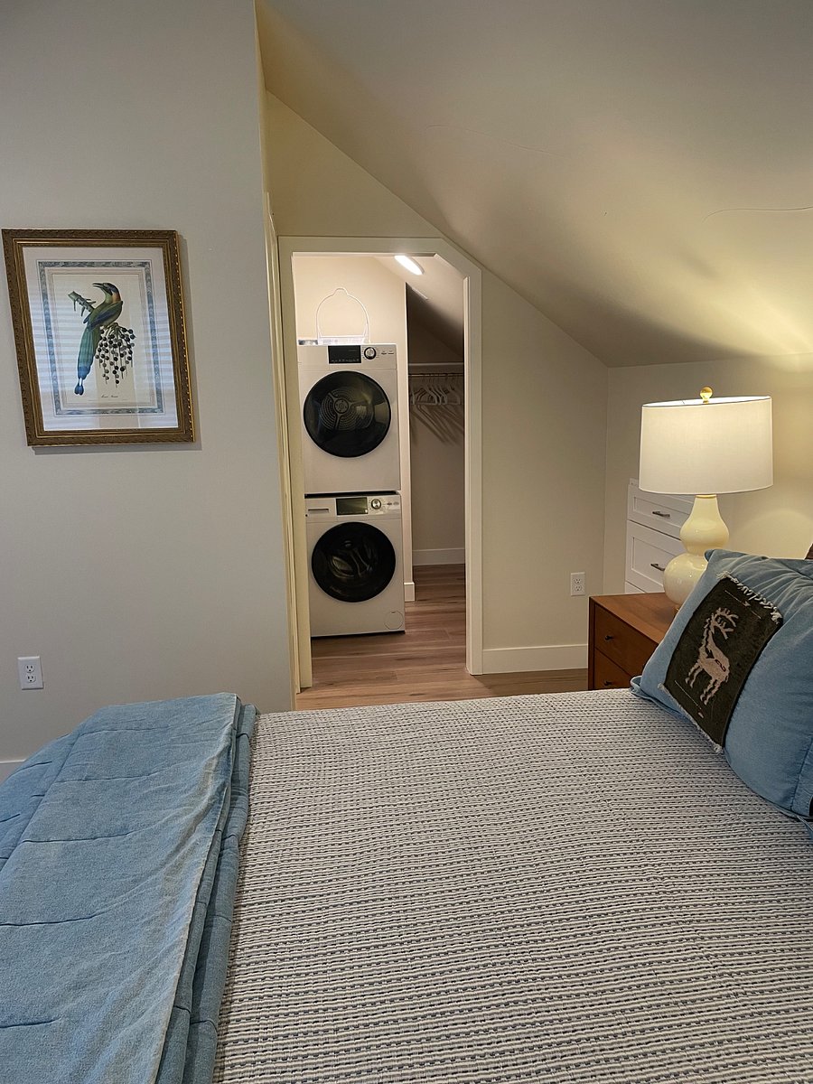 Side view into closet with washer and dryer