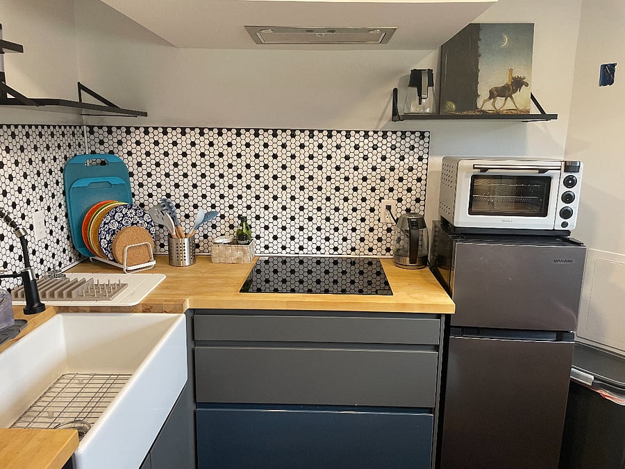 Kitchen has induction stove top, microwave and or an air fryer, renter's choice.
