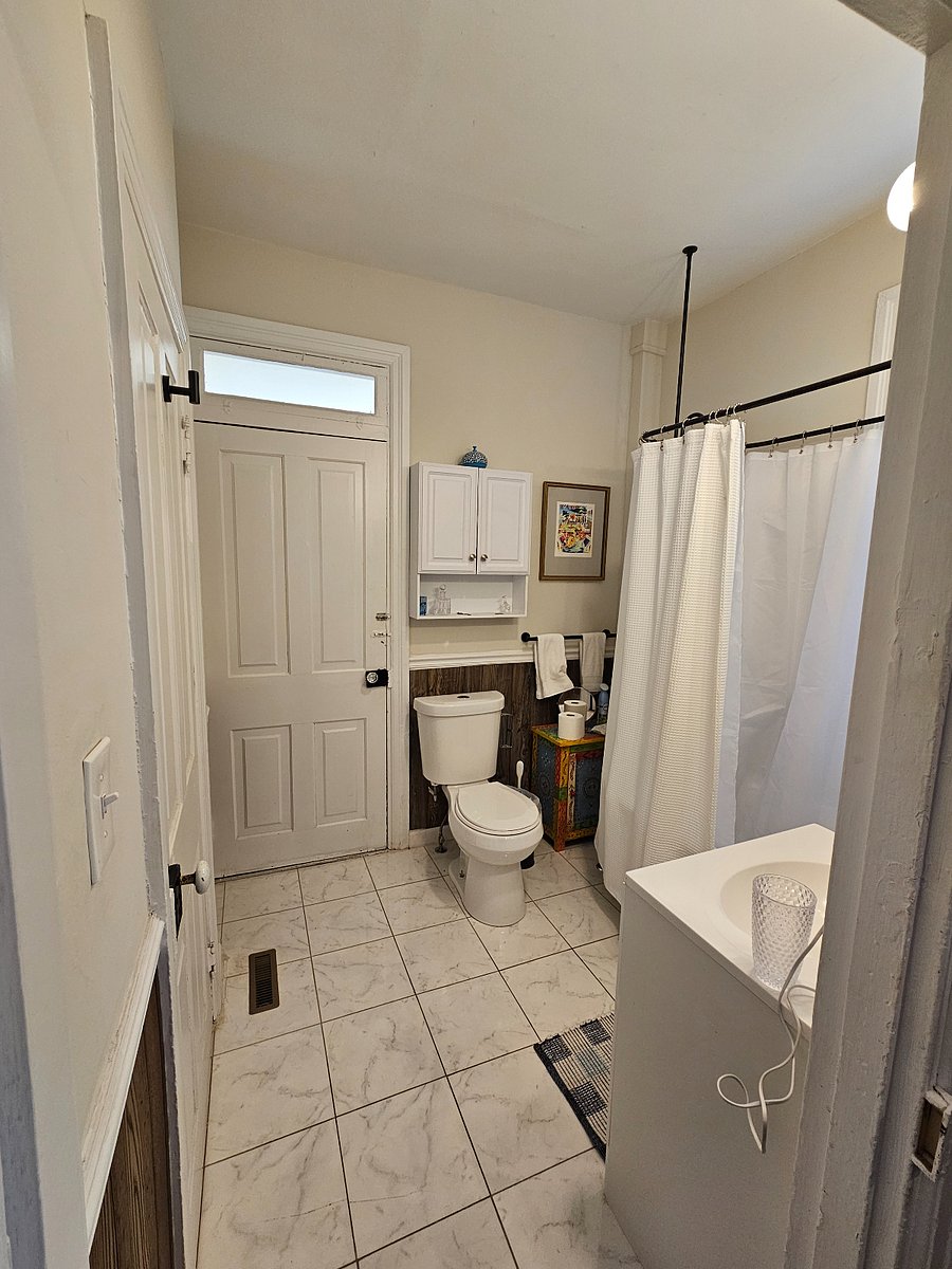 One bathroom, wonderful, wonderful tub, adequate shower (to upgrade in the future).  Adequate bath facilities.
