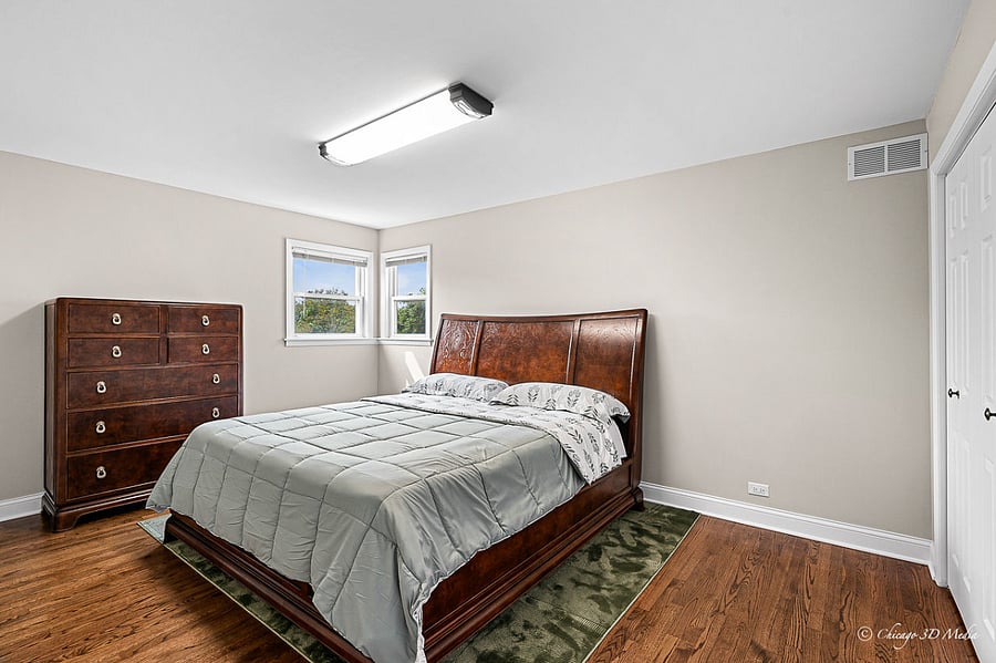 Spacious primary bedroom with premium American Drew furniture and King sized bed.
