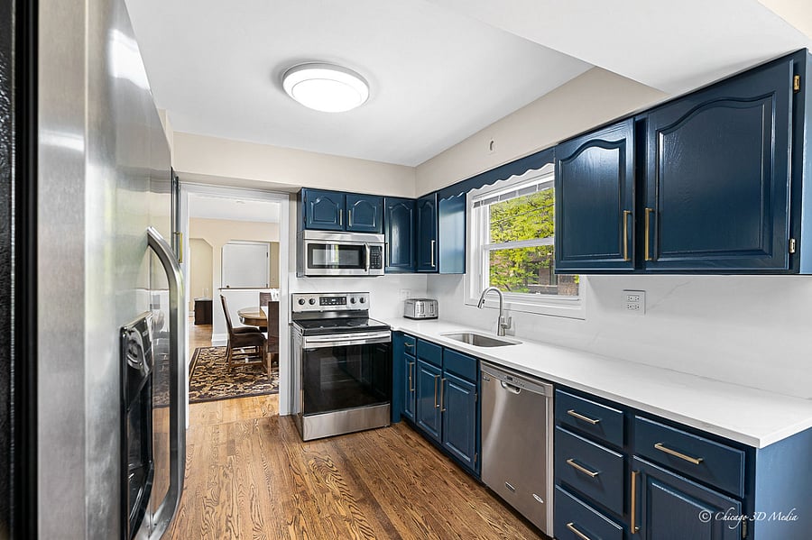 All new modern and sophisticated counter-tops with subtle marbling and full backsplashes.