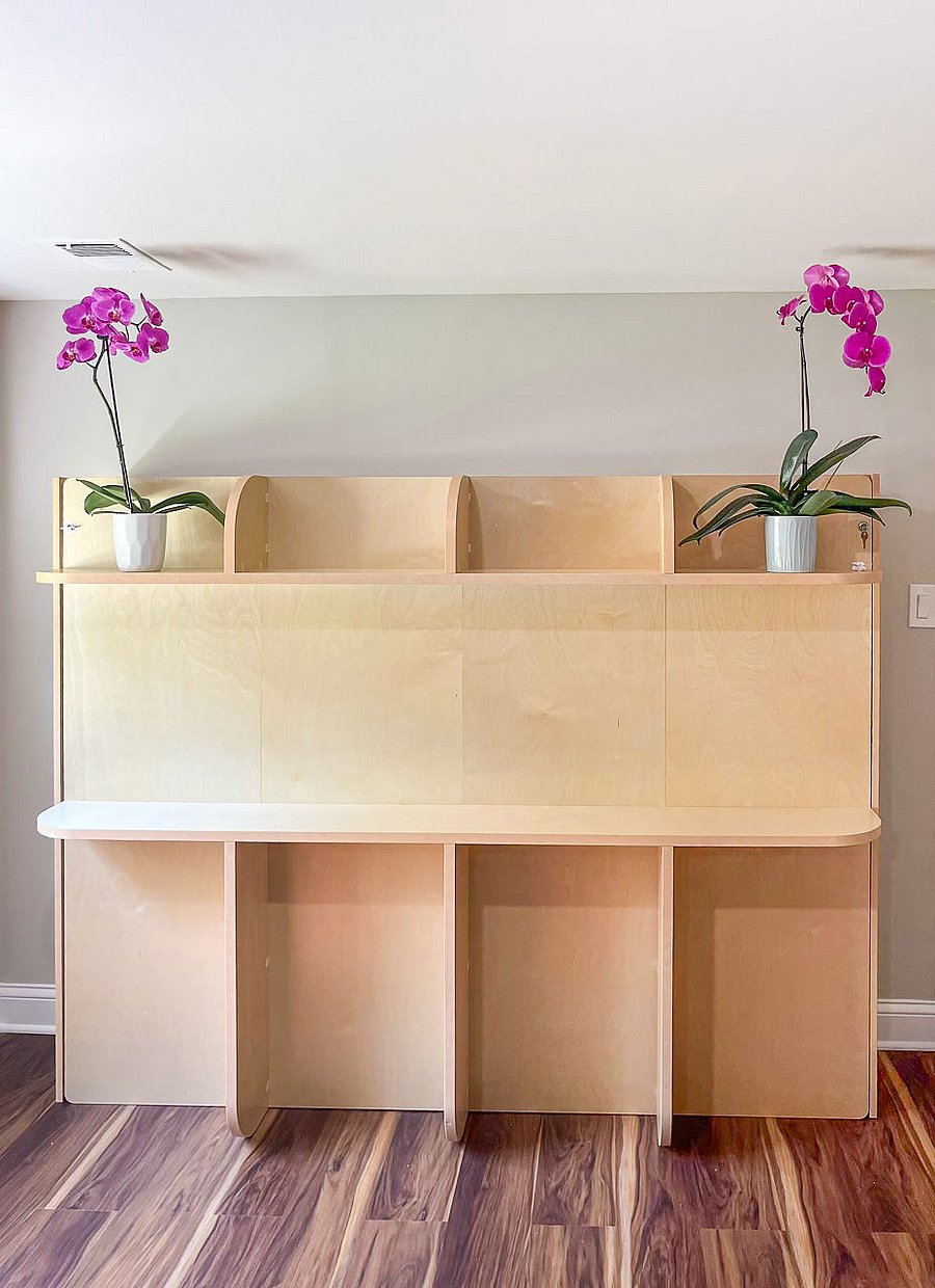 High End Murphy bed that converts into a beautiful solid maple bookcase when up.
