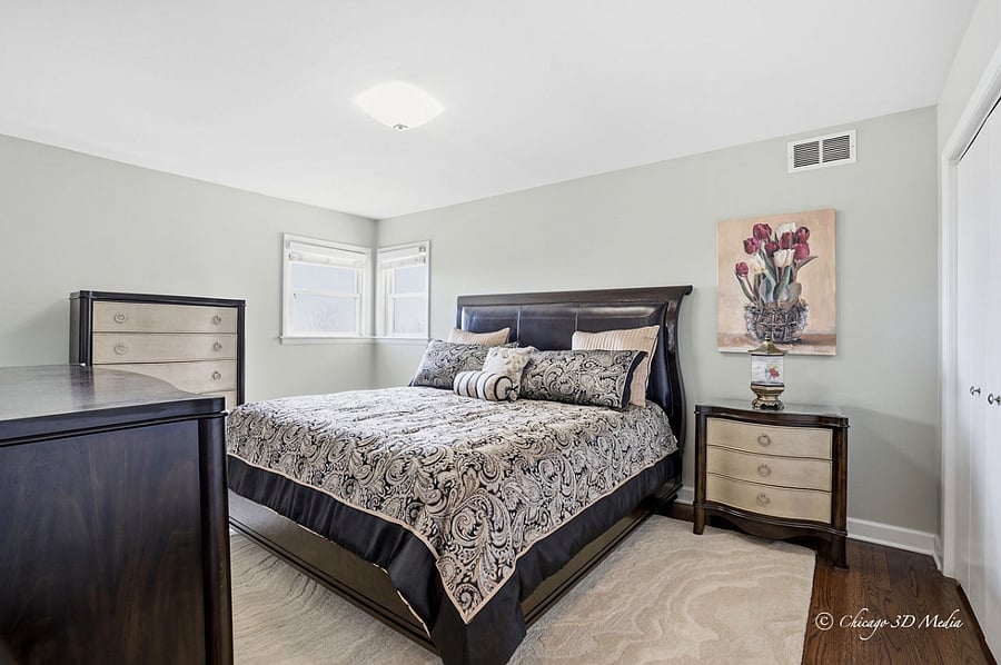 Luxurious Primary king sized suite with solid wood Bernhardt bed including a buttery smooth premium leather headboard.