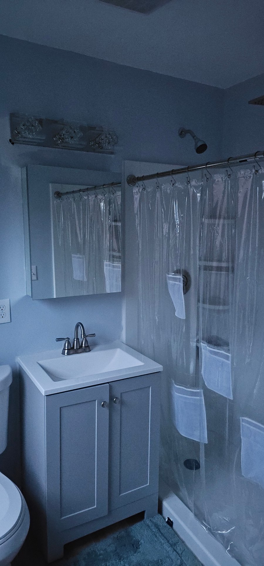 Bathroom off the bedroom regular shower and Rain shower