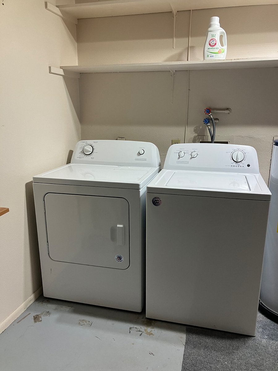 Washer and Dryer for unit are in attached one car garage
