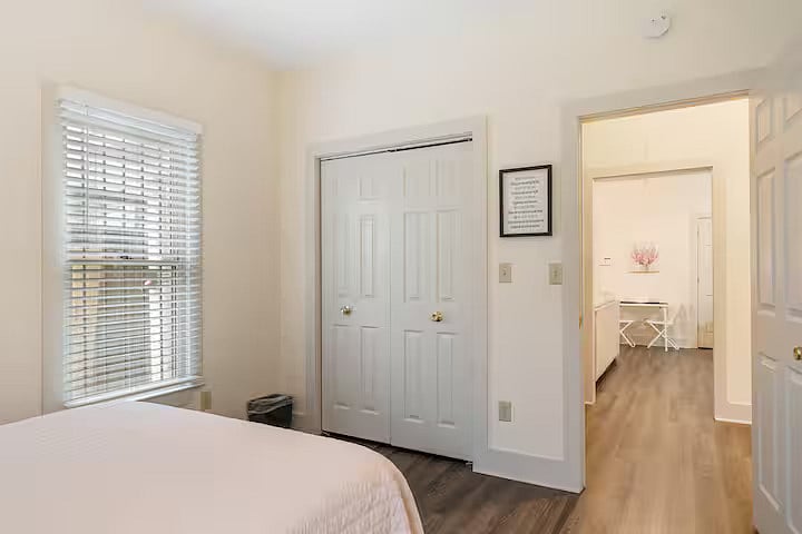 Bedroom 2 features a comfy queen bed and spacious closet.