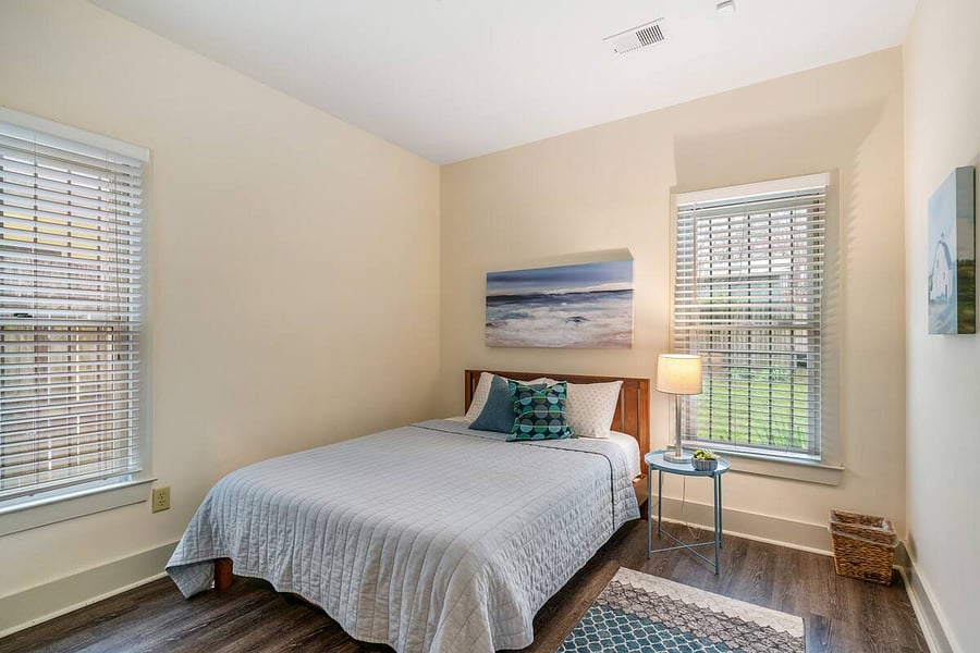 Bedroom 3 features a comfy queen bed and closet.