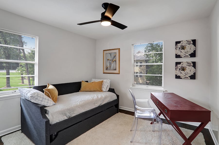 Bedroom 2 has a twin with a trundle and is set up with a desk for Work from Home time.