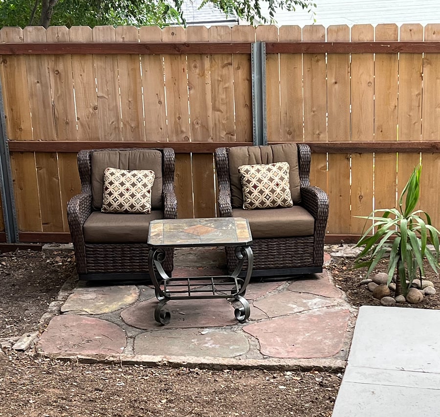 Lovely outdoor seating area with comfy swivel chairs. This area is shaded for most of the day, and you can see lots of birds while relaxing here.
