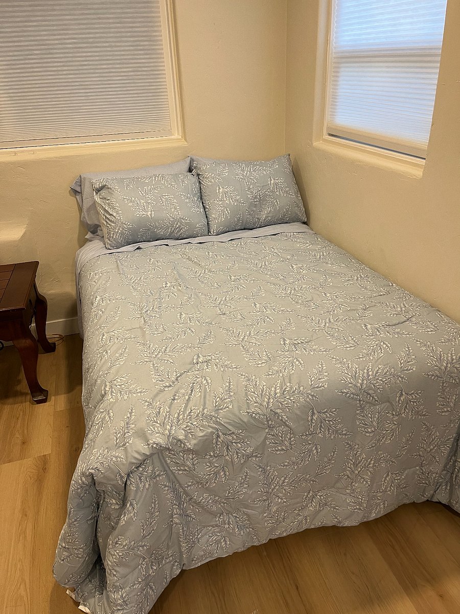 Very comfortable full-sized bed, with high-quality Sealy mattress.