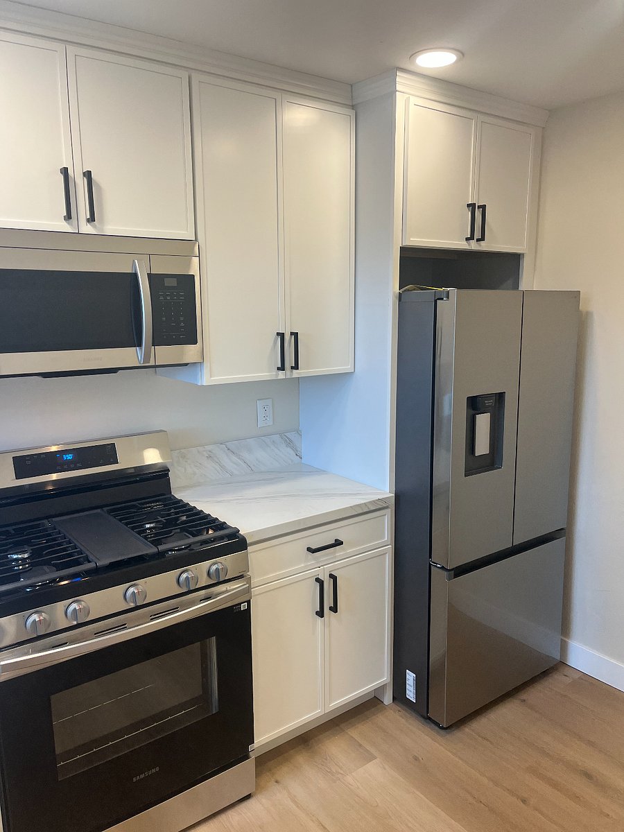 Full kitchen includes all brand new oven/stove, microwave, full-sized refrigerator, and lots of amenities like keurig coffee maker, hot water pot, etc.
