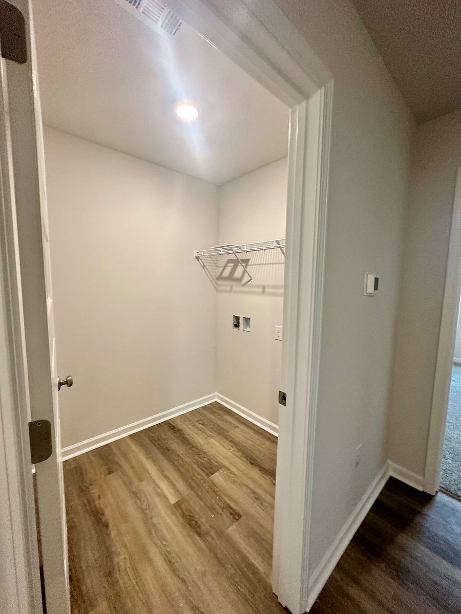 This photo should be deleted.  Is picture of unfinished laundry room. 