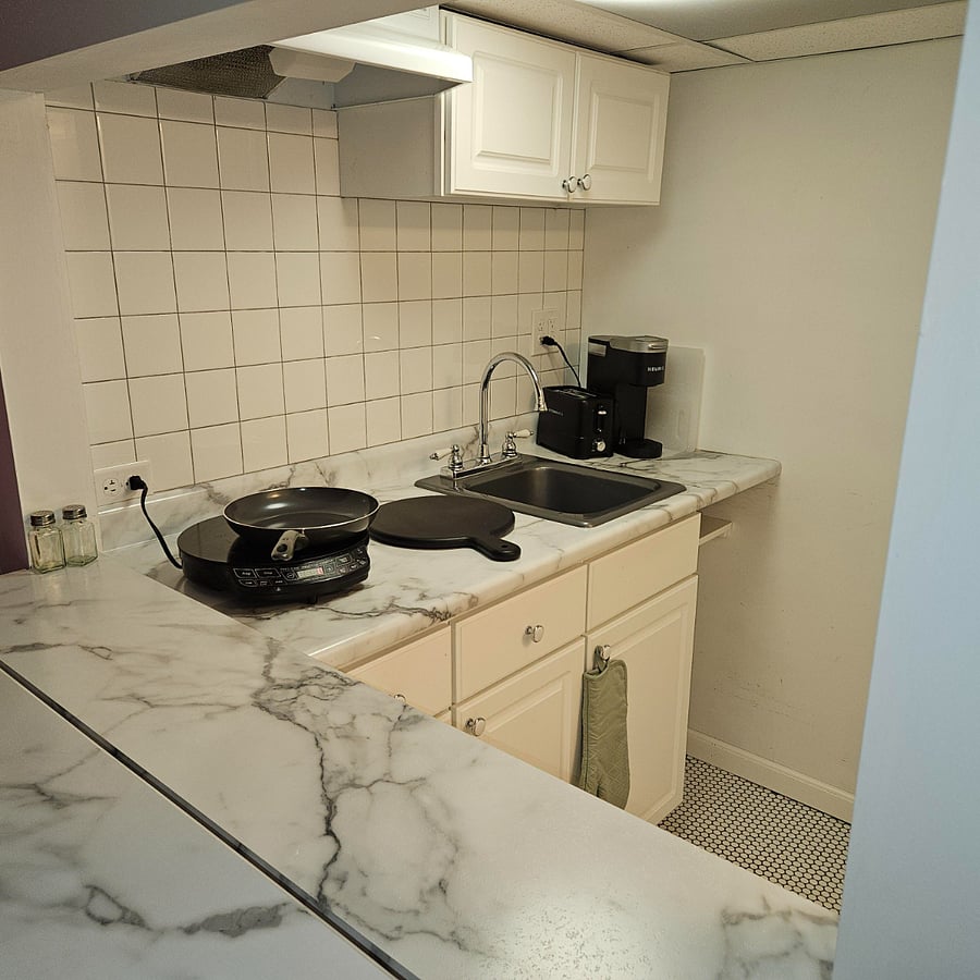 Kitchenette with induction cooktop, keurig