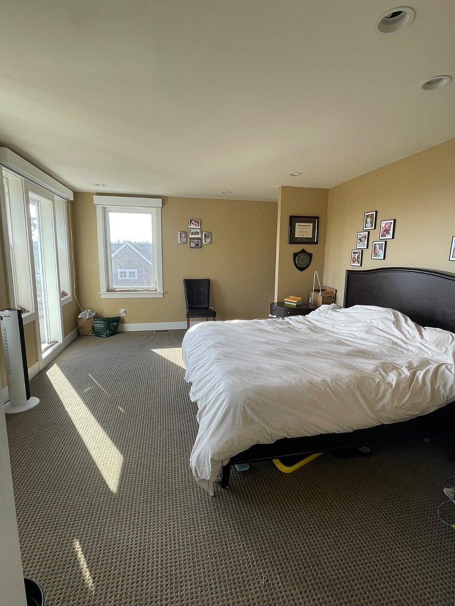 Bedroom #1: Amazing natural light illuminates Master Bedroom suite with king bed with water view
