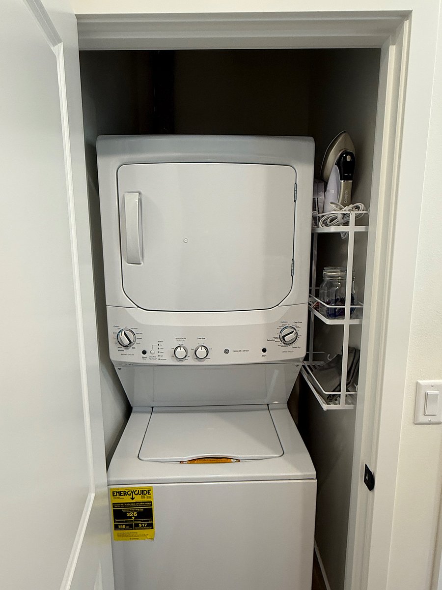 In unit laundry with starter pods; Garment steamer provided