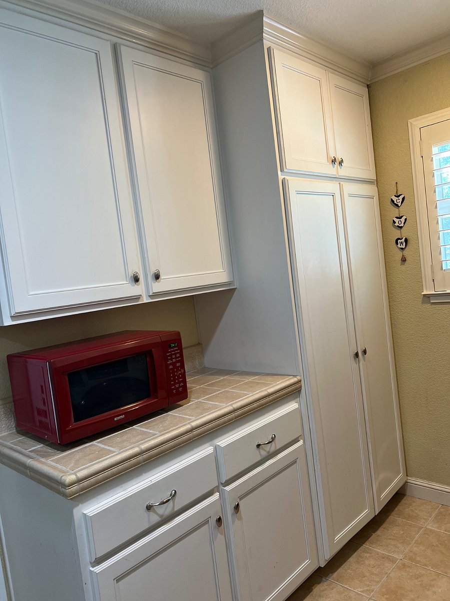 Kitchenette with big closet for storage. 