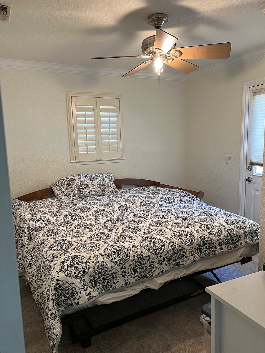 Twin trendle bed pulls out to become a queen bed. The matresses are comfortable and soft; bedding is new
