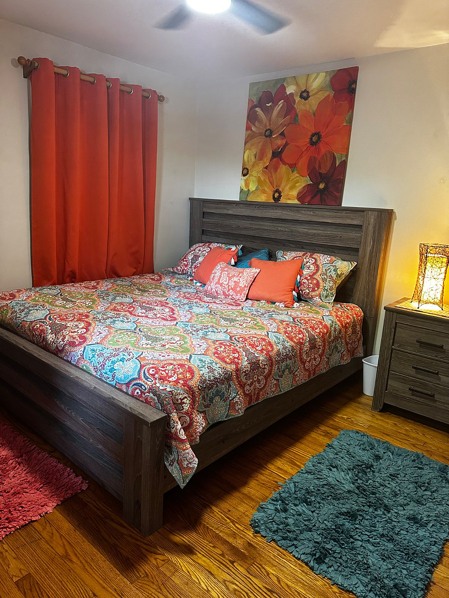 Private Bedroom with king bed and ample storage.