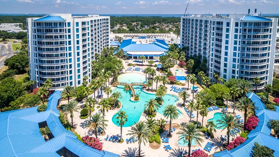 A bird's eye view of the beautiful resort and outdoor amenities. Multiple Pools, Splash Pad & Hot Tub