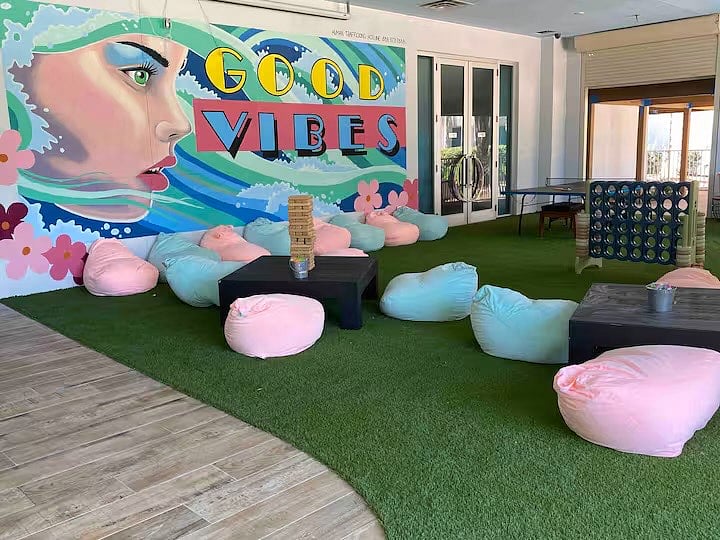 The bar is conveniently located right downstairs and overlooks the pool. There is a lounge with fire pits and ton of seating to hang out, order food/drinks and even work for the day if needed.