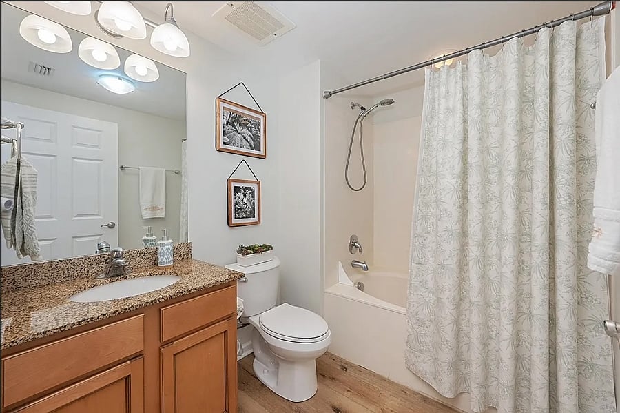 This is your private Primary Bathroom with a Tub & Shower Condo. There is also a SECOND Full Bathroom for the second bedroom with a Walk-In Shower.