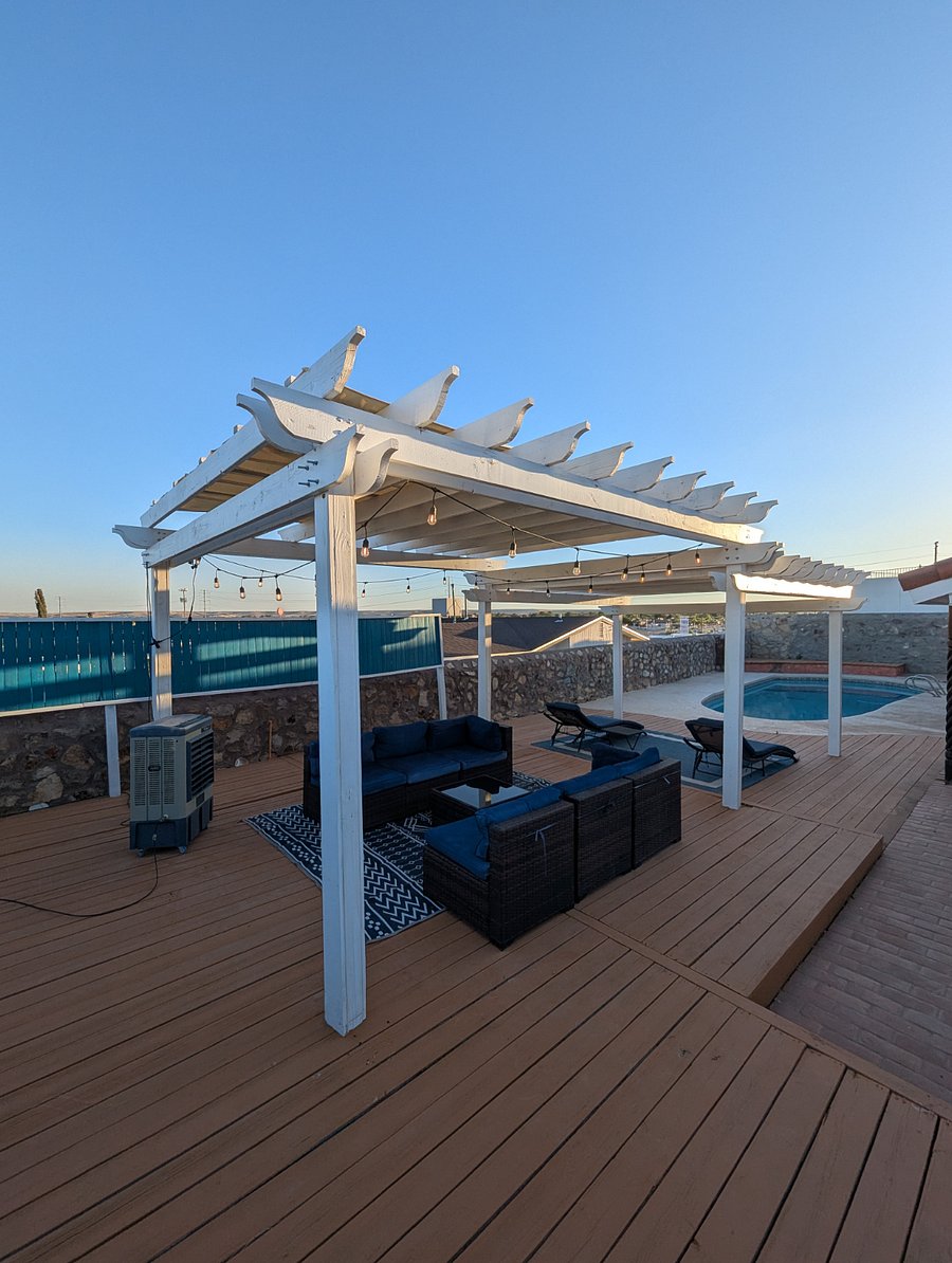 Swimming pool with pergola