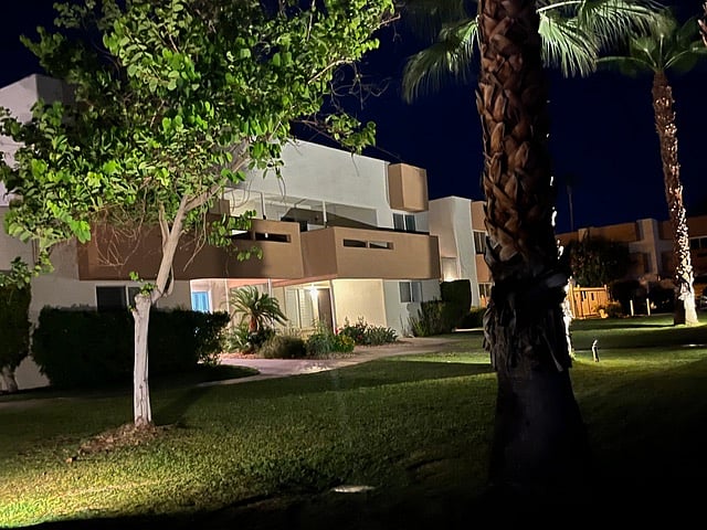 Here is a outdoor view of the complex at night.