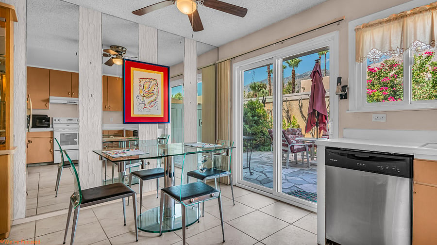 Dining room table has perfect view of patio