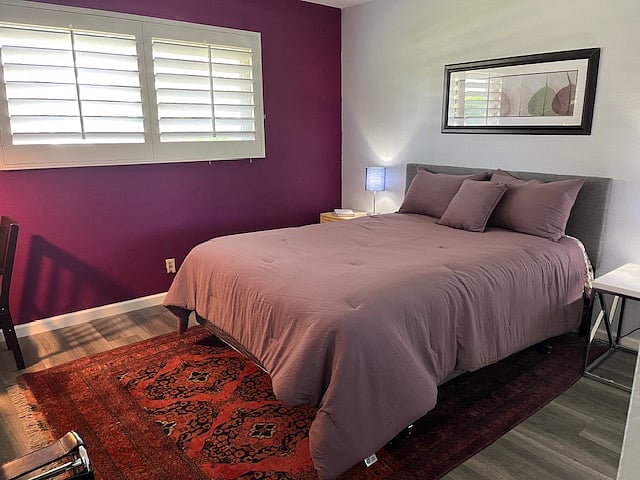 Bedroom 1 has plenty of natural light.