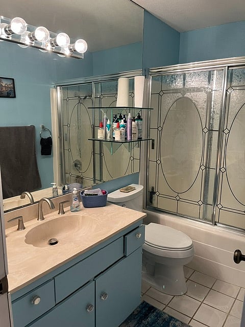 Bathroom with tub and shower.