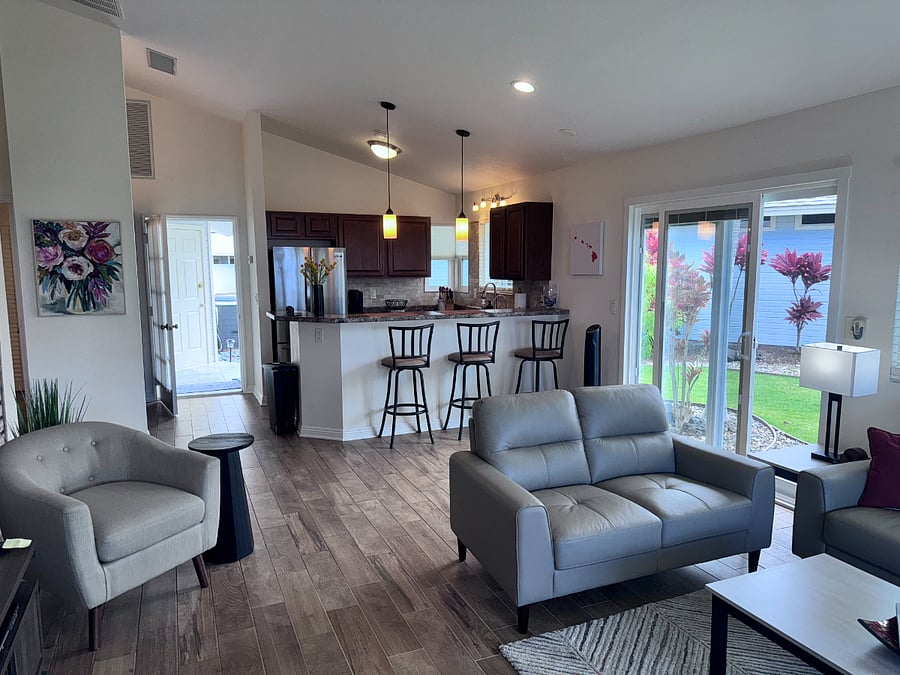 Entry, Living Area and Kitchen. Door to large grass garden