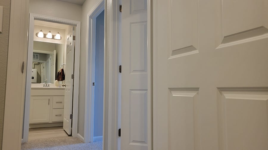 Entrance to the bathroom shared by the tenants in the 2 bedrooms
