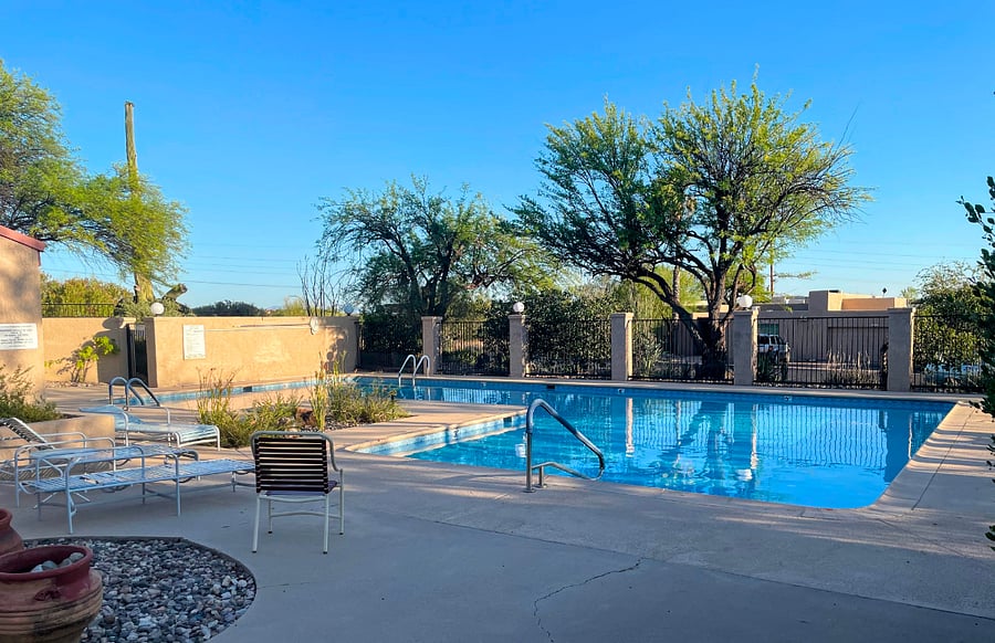 Pristine community pool open 6AM -11PM daily. Not heated.