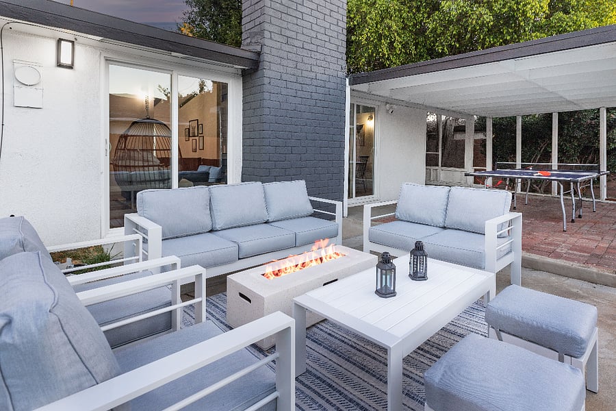 Comfortable outdoor lounge with fire feature for evening relaxation