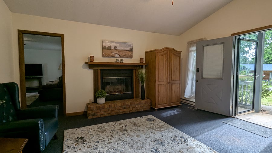 A full-sized clothing bureau is provided, offering plenty of drawer space to keep your belongings neatly stored and easily accessible during your stay ideal for extended visits or anyone who likes to stay organized.