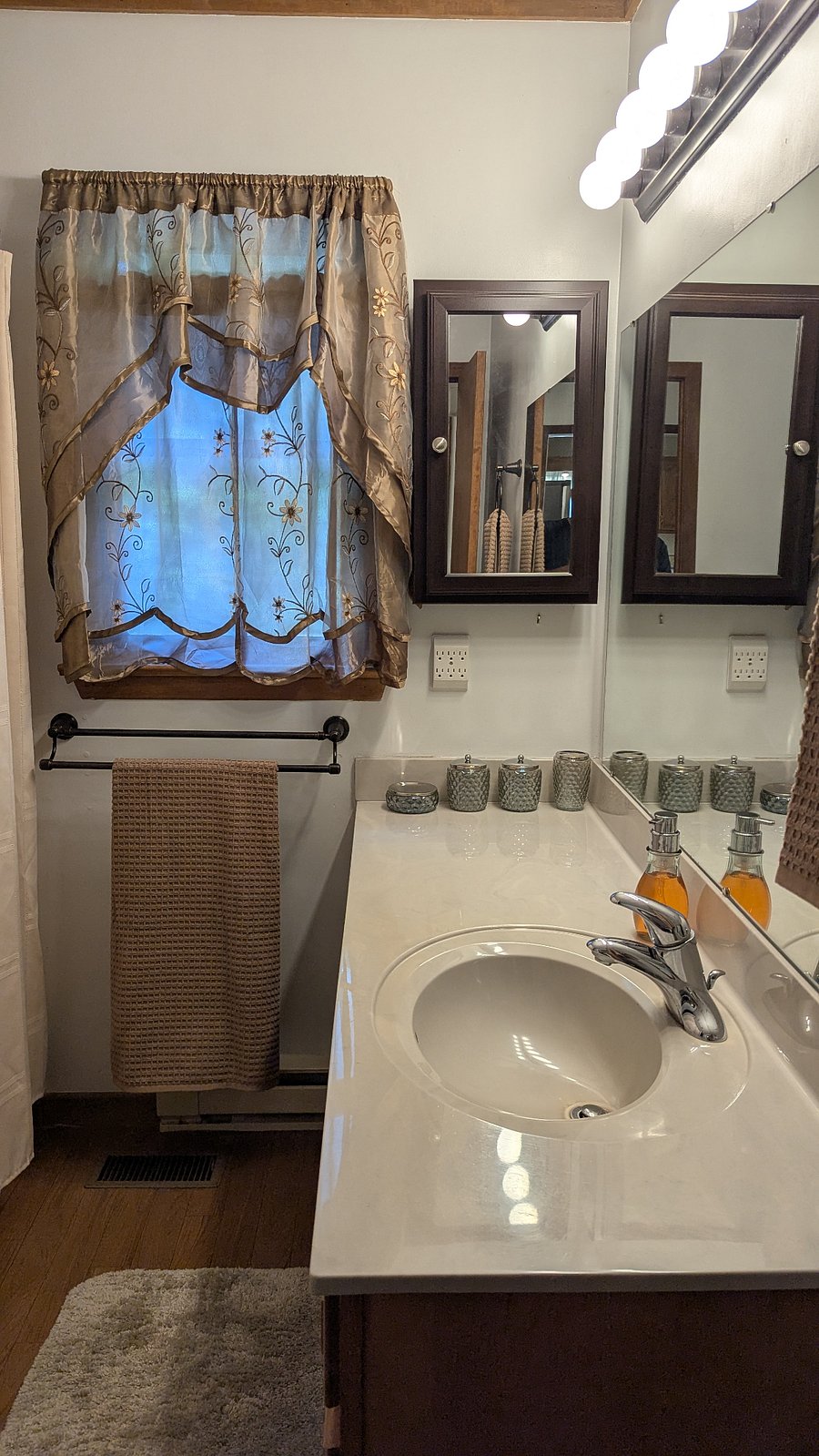 The bathroom offers a full shower and tub combo, soft towels, and all the basic amenities you need for a comfortable stay from shampoo and soap to a peaceful place to unwind after a long shift or day of exploring
