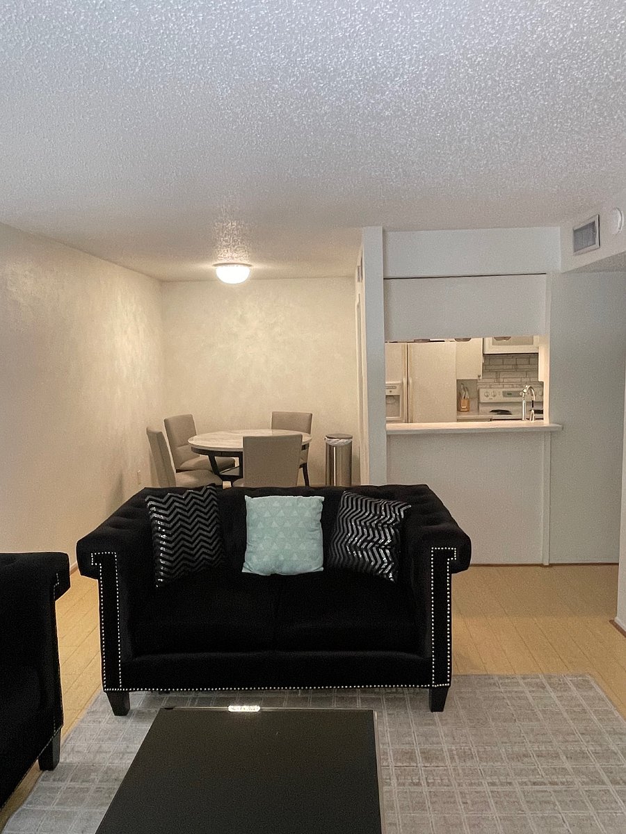 Dining room with front view of kitchen.