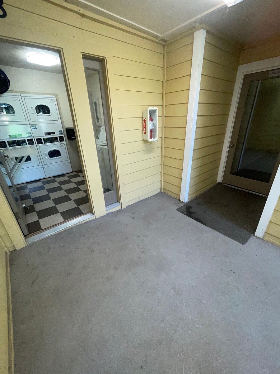 Laundry unit steps away from apartment.