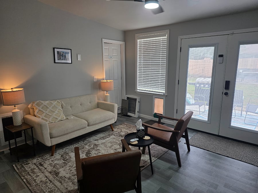 Bonus room - 2nd sitting area. Patio doors out to yard.