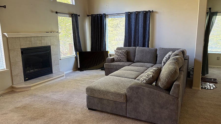 Common living room couch opens to a bed