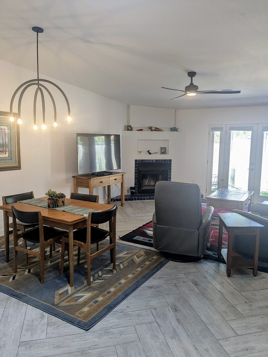 Dining room is shared with living room. The table has two pull out leaves, doubling the length. Watch tv and view the patio while dining.