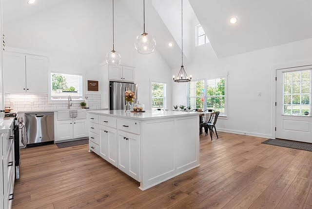 Kitchen fully equipped with cookware dishes gas stove & microwave