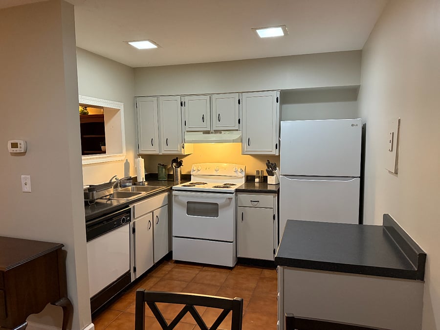 Kitchen with appliances, utensils, and a variety of supplies for your cooking needs!