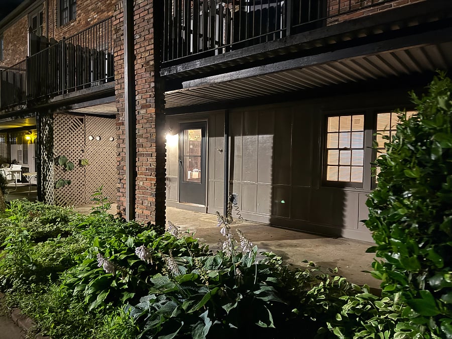 Evening view of lower (terrace) level condo.