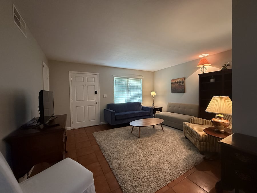 Living area has plenty of seating and makes for a comfy gathering area!