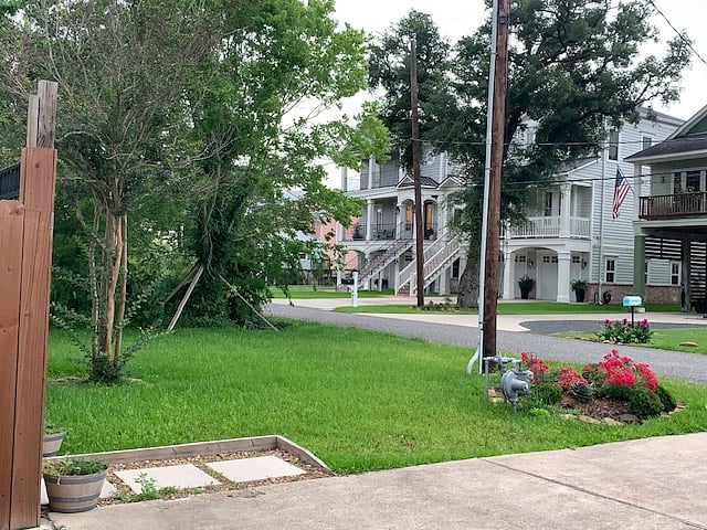 view from driveway , 4 car parking
with carport to cover one car and golf cart